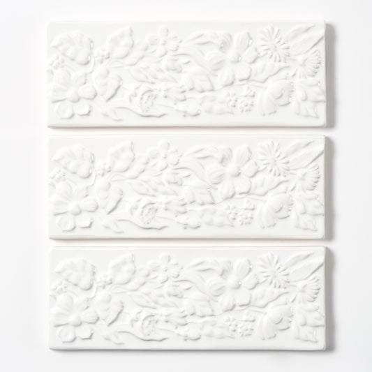 1980s Vintage Italian Raised White Floral Border Tile, 104 Linear Ft Available - 26 Linear Ft Per Box