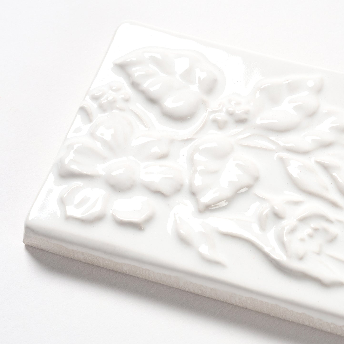 1980s Vintage Italian Raised White Floral Border Tile, 104 Linear Ft Available - 26 Linear Ft Per Box