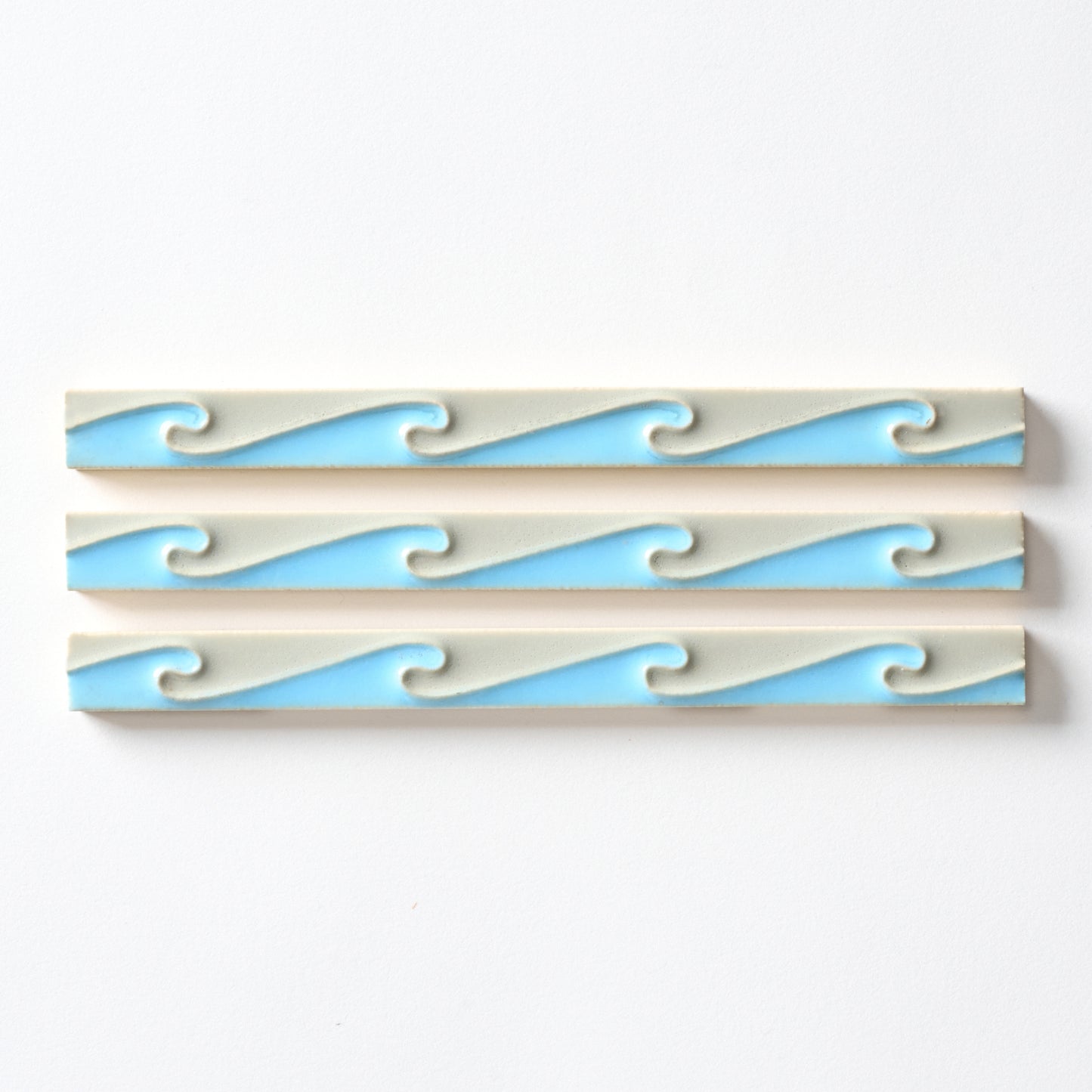 1920s American Encaustic Blue & Gray Wave Trim Tile